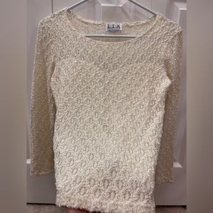 Cream lace long sleeve top, front lined.